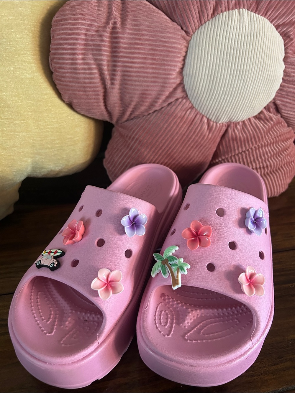 Crocs Pink stomp slides with charms